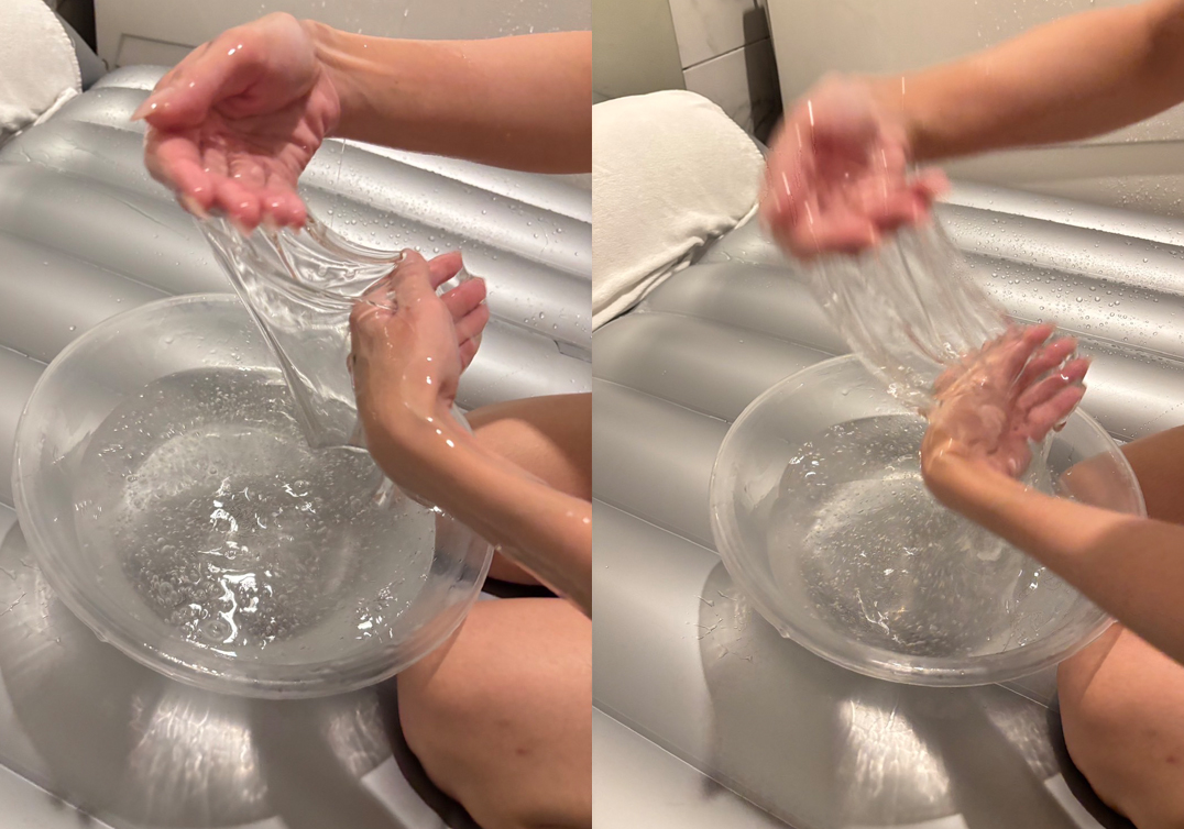 thai woman preparing clear nuru gel on a silver inflatable bed